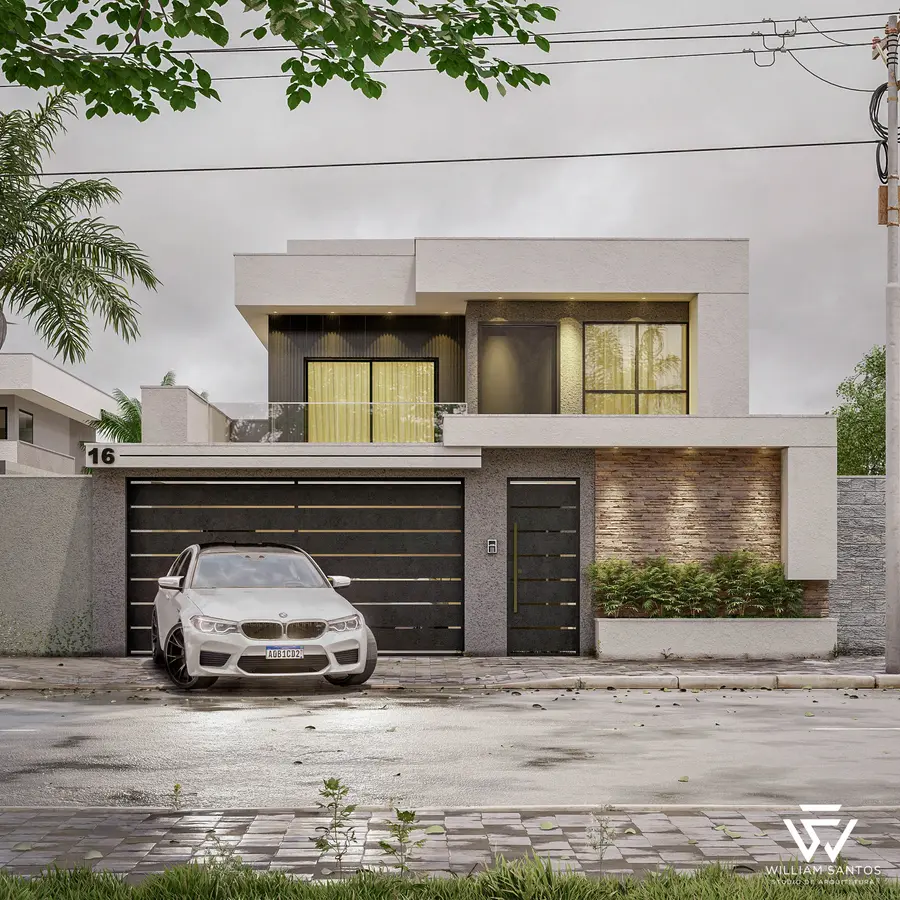 Sobrado com portão de garagem e revestimento em pedra