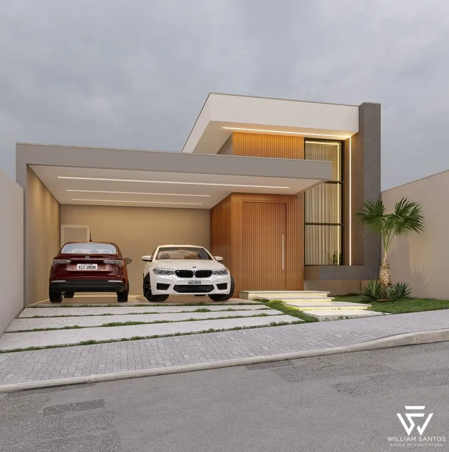 Residência térrea com porta de madeira e garagem